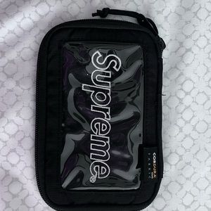 Black Supreme multi purpose wallet.